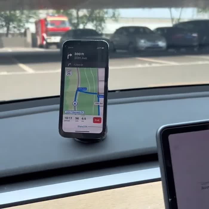 Phone displaying navigation on the X68 dashboard mount